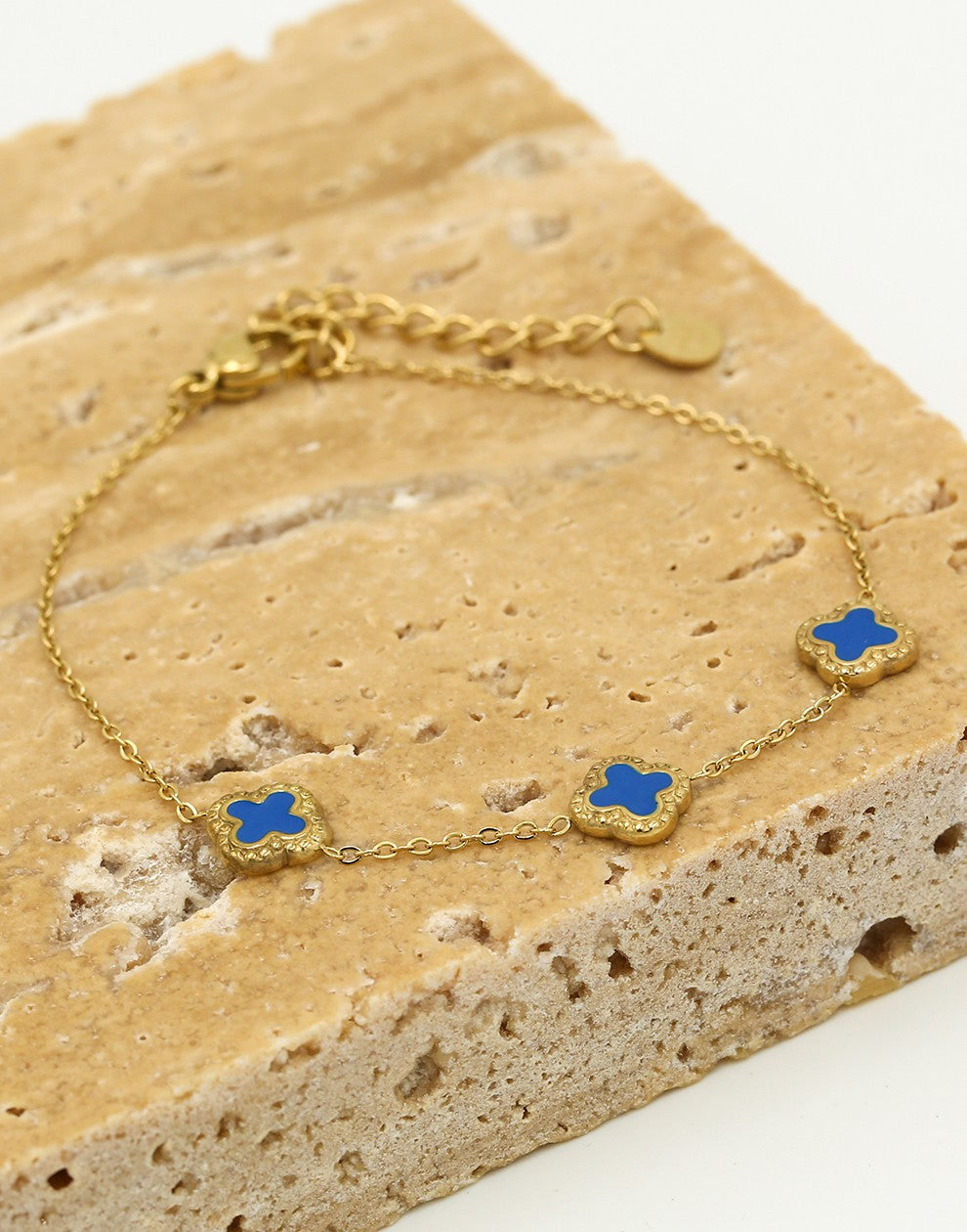 Armband klavers blauw goudkleurig