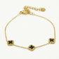Armband klavers zwart goudkleurig