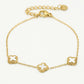 Armband klavers wit goudkleurig