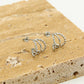 Triple silver-colored earrings