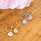 Oorringen smiley goudkleurig
