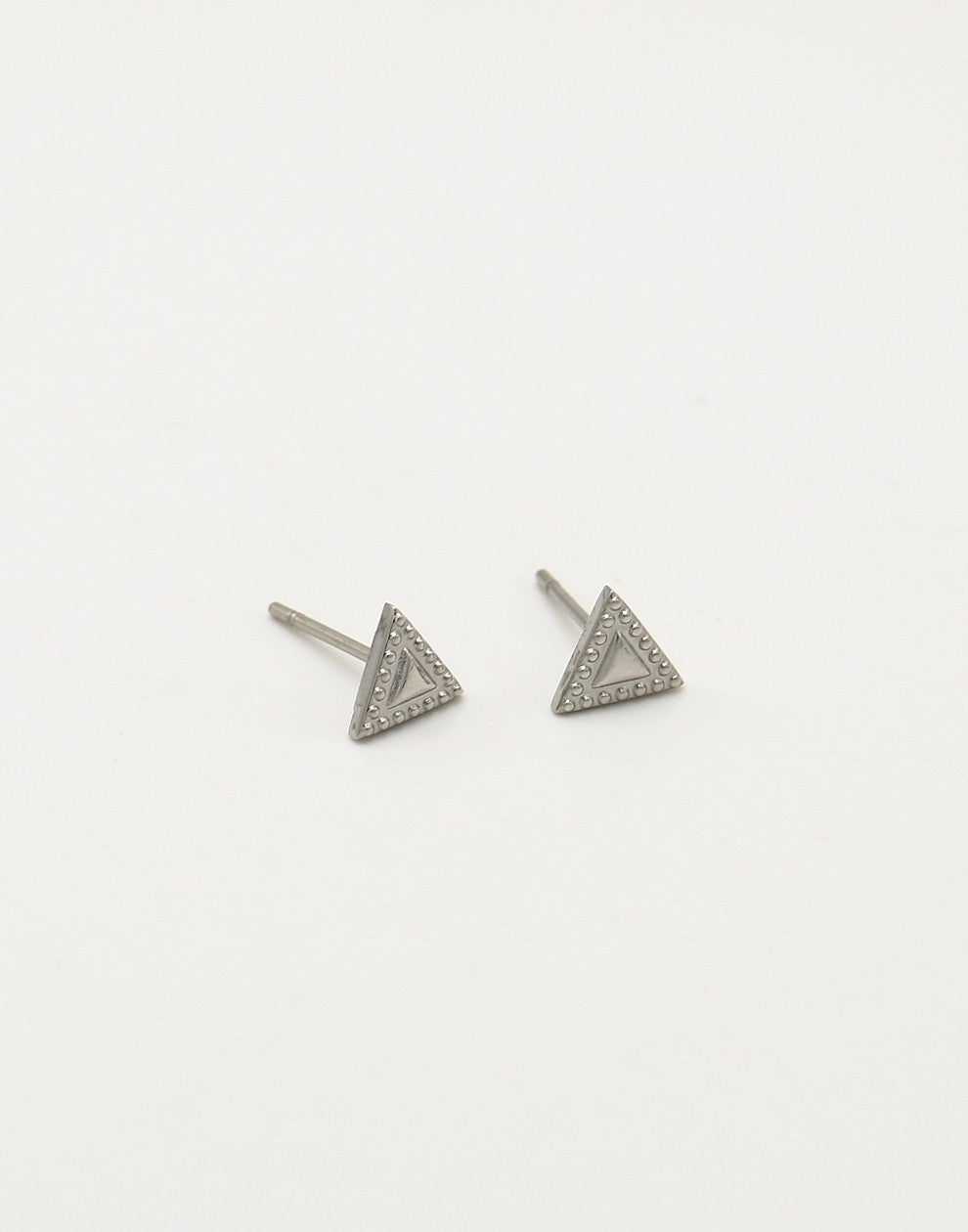 Silver-colored triangle stud with a beaded edge