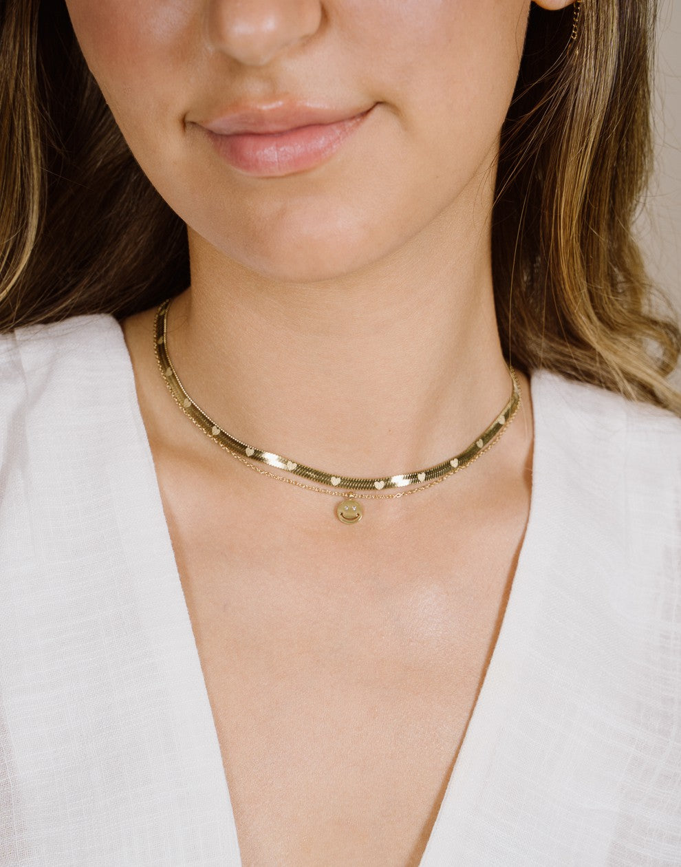 ketting smiley hanger goudkleurig