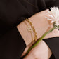 Coarse gold-colored link bracelet