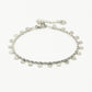 Twisted bracelet with silver-colored coins