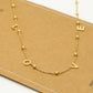 Ketting love bolletjes goudkleurig