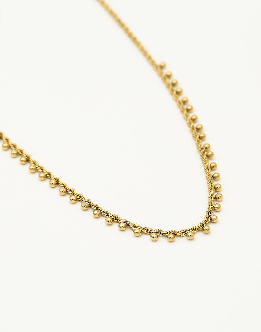 Gedraaide ketting bolletjes goudkleurig