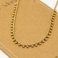 Gedraaide ketting bolletjes goudkleurig