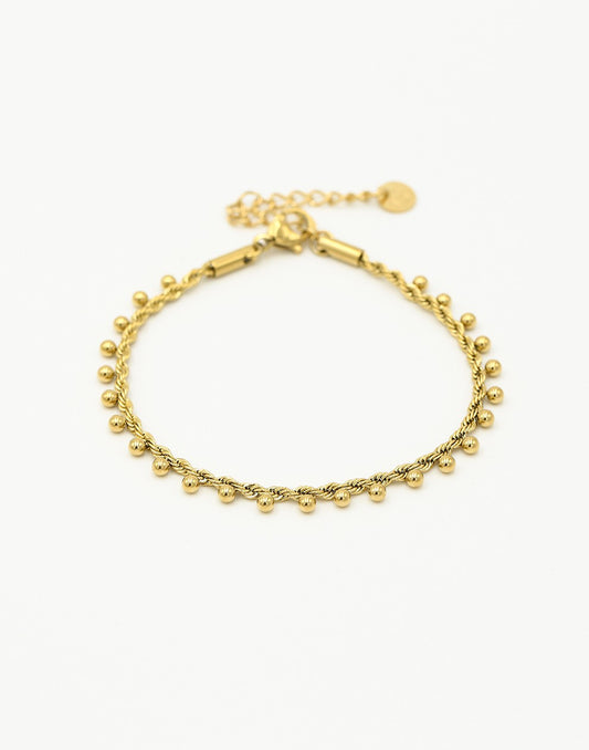 Gedraaide armband bolletjes goudkleurig