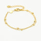 Armband dubbel bolletjes goudkleurig