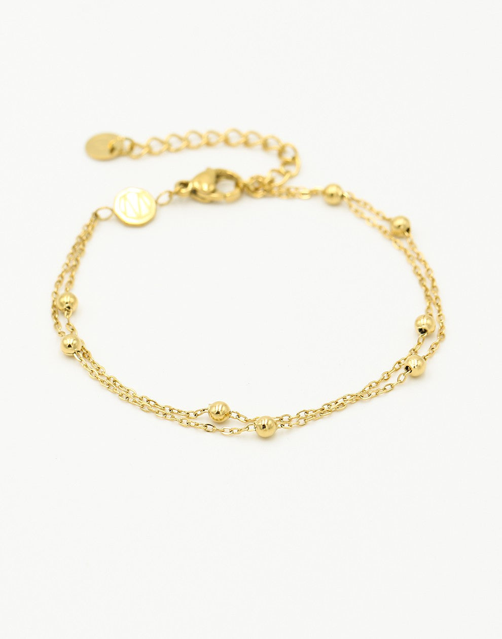 Armband dubbel bolletjes goudkleurig