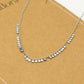 Ketting kleine muntjes zilverkleurig