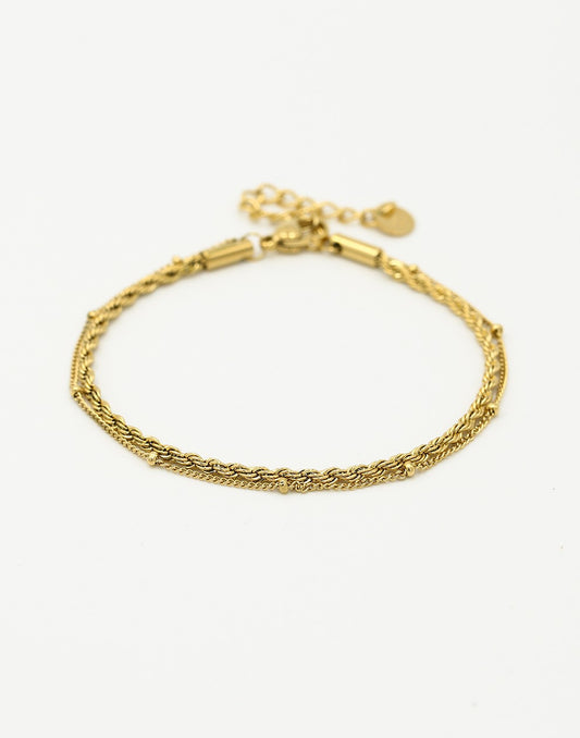 Armband dubbel gedraaid bolletjes goudkleurig