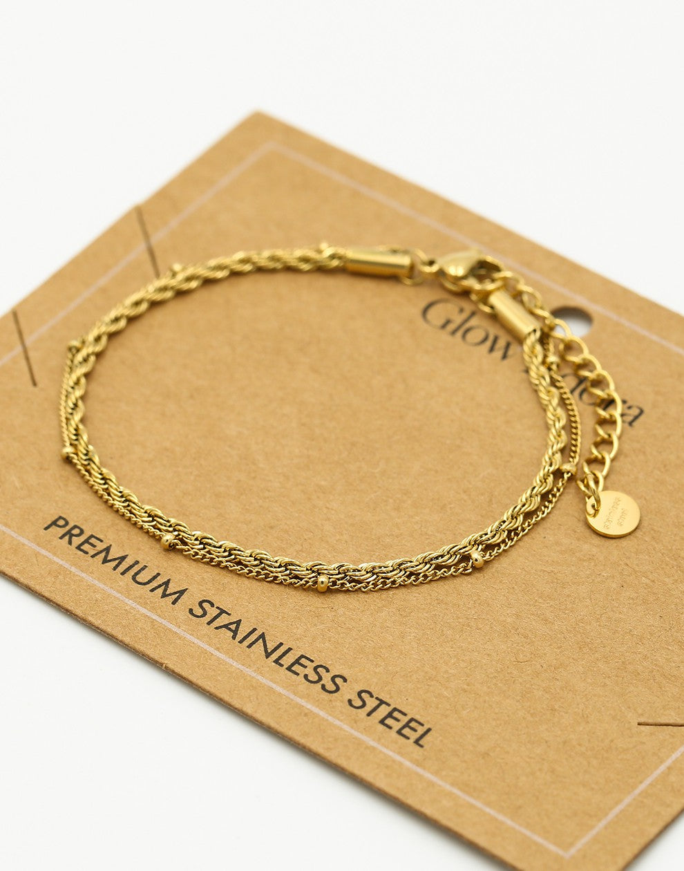 Armband dubbel gedraaid bolletjes goudkleurig