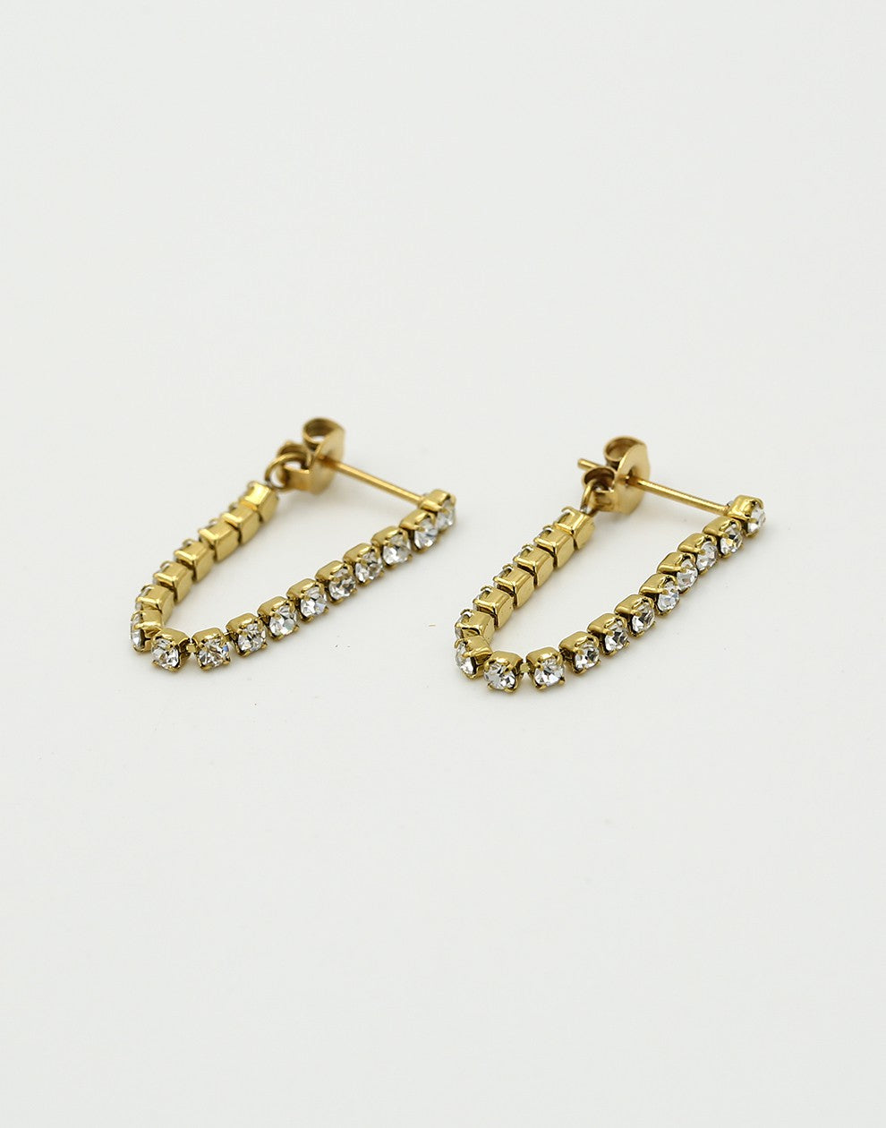 Tennis oorsteker chain goudkleurig