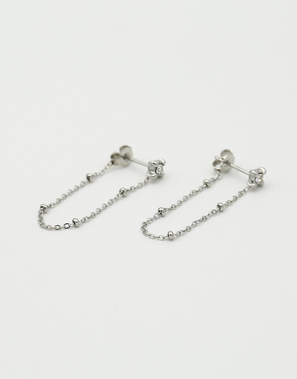 oorbellen steentje met ketting zilverkleurig