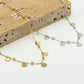 Bolletjes ketting met muntjes goudkleurig