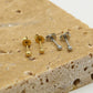 goudkleurigen oorknopjes