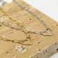 Schakelketting open hart goudkleurig
