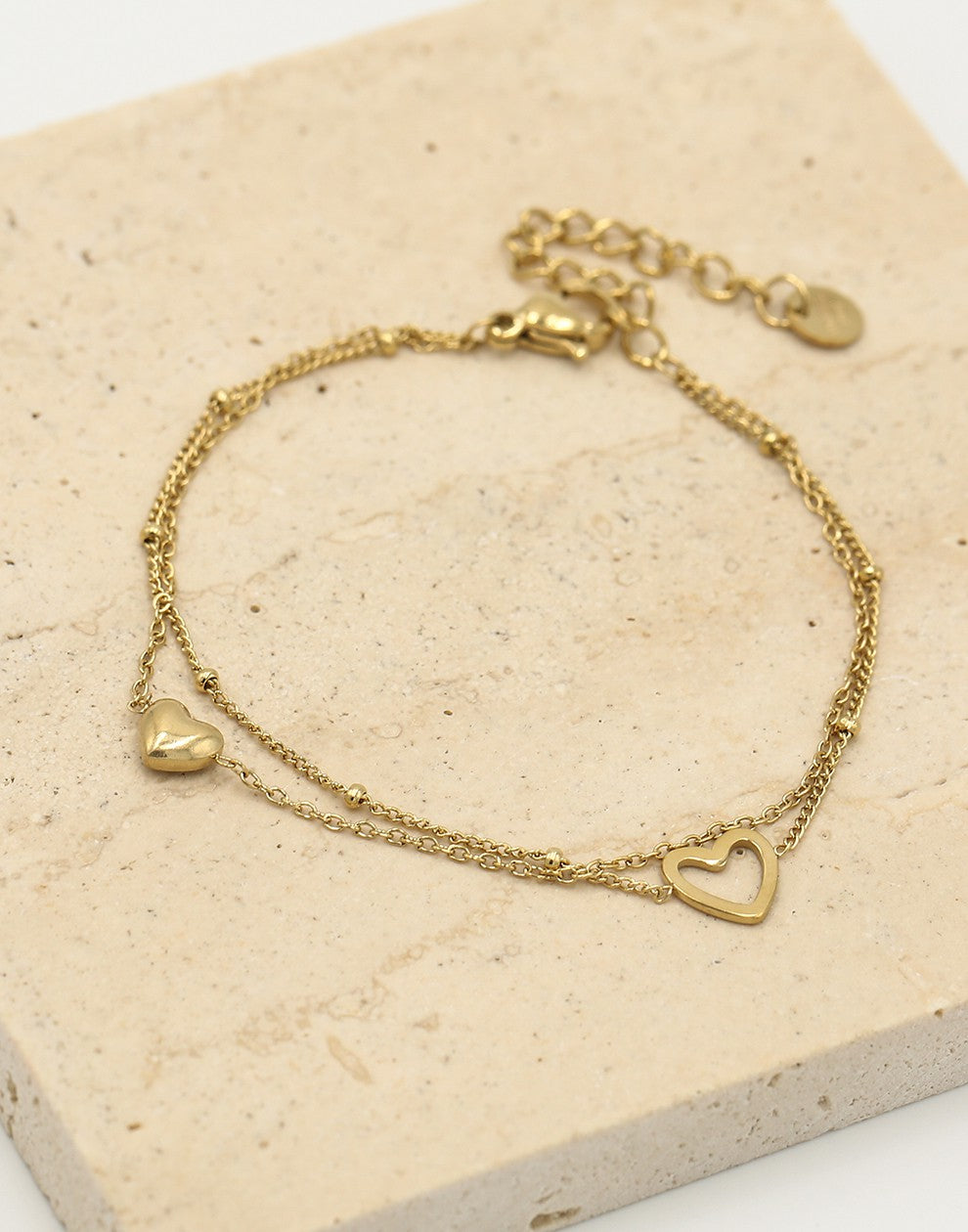 Dubbel armbandje met hartjes goudkleurig
