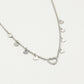 Fijne ketting open hartje met vallende hartjes zilverkleurig