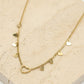 Fijne ketting open hartje met vallende hartjes goudkleurig
