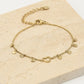 Fijne armband open hartje met vallende hartjes goudkleurig