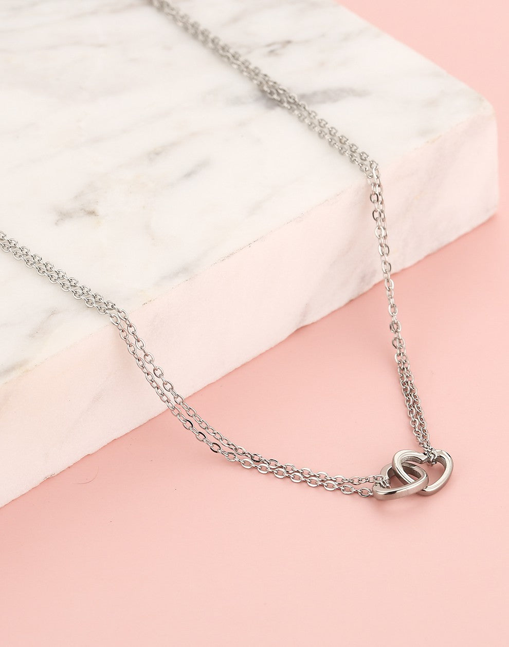 Fijne ketting dubbele hartjes zilverkleurig