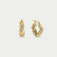 Twisted hoop earrings with rhinestones in gold color