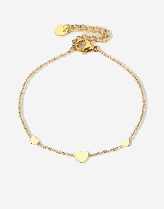 Armband 3 hartjes goudkleurig