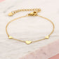 Armband 3 hartjes goudkleurig