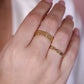 ring gevlochten goudkleurig