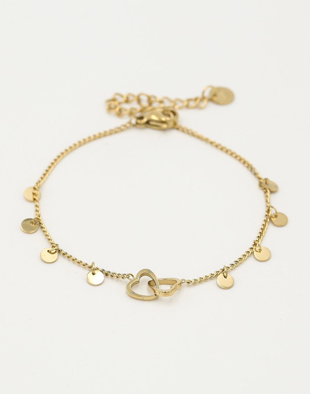 Armband dubbele hartjes met muntjes in goudkleurig