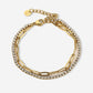 Armband tennis met paperclip schakel goudkleurig