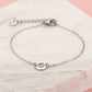 armband uitgesneden hartje zilverkleurig