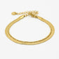 Armband dubbel snake en bolletjes goudkleurig