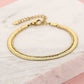 Armband dubbel snake en bolletjes goudkleurig