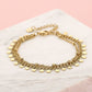 Armband muntjes en bolletjes chain goudkleurig