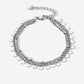 Armband muntjes en bolletjes chain zilverkleurig
