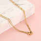 ketting bolletjes met dubbele hartjes goudkleurig