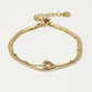 Dubbelle armband snake chain en hartjes goudkleurig