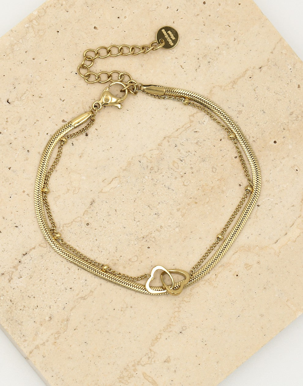 Dubbelle armband snake chain en hartjes goudkleurig