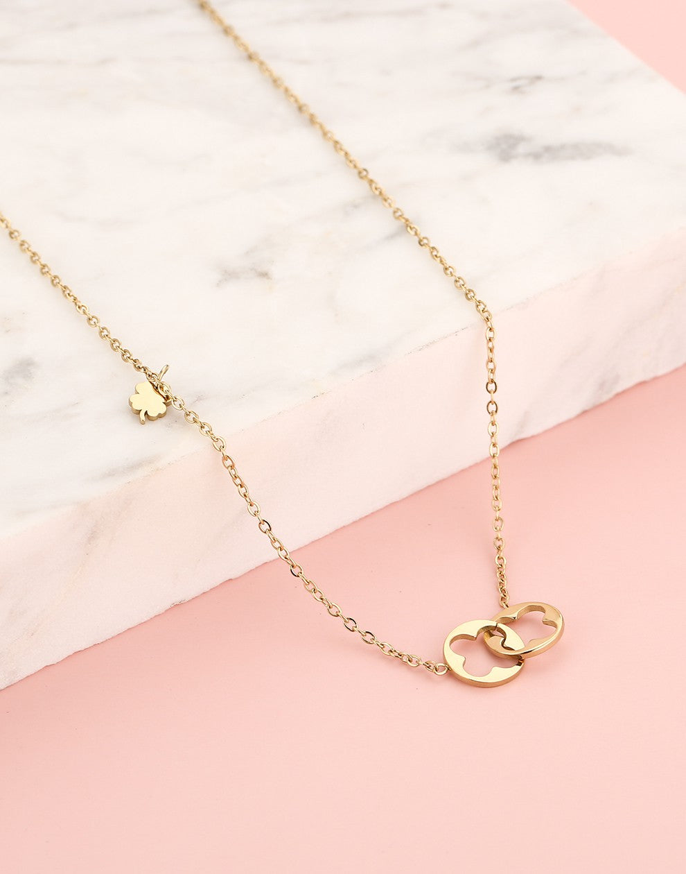 Ketting dubbele klavertjes connected goudkleurig