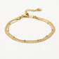 Dubbele armband plat met bolletje goudkleurig