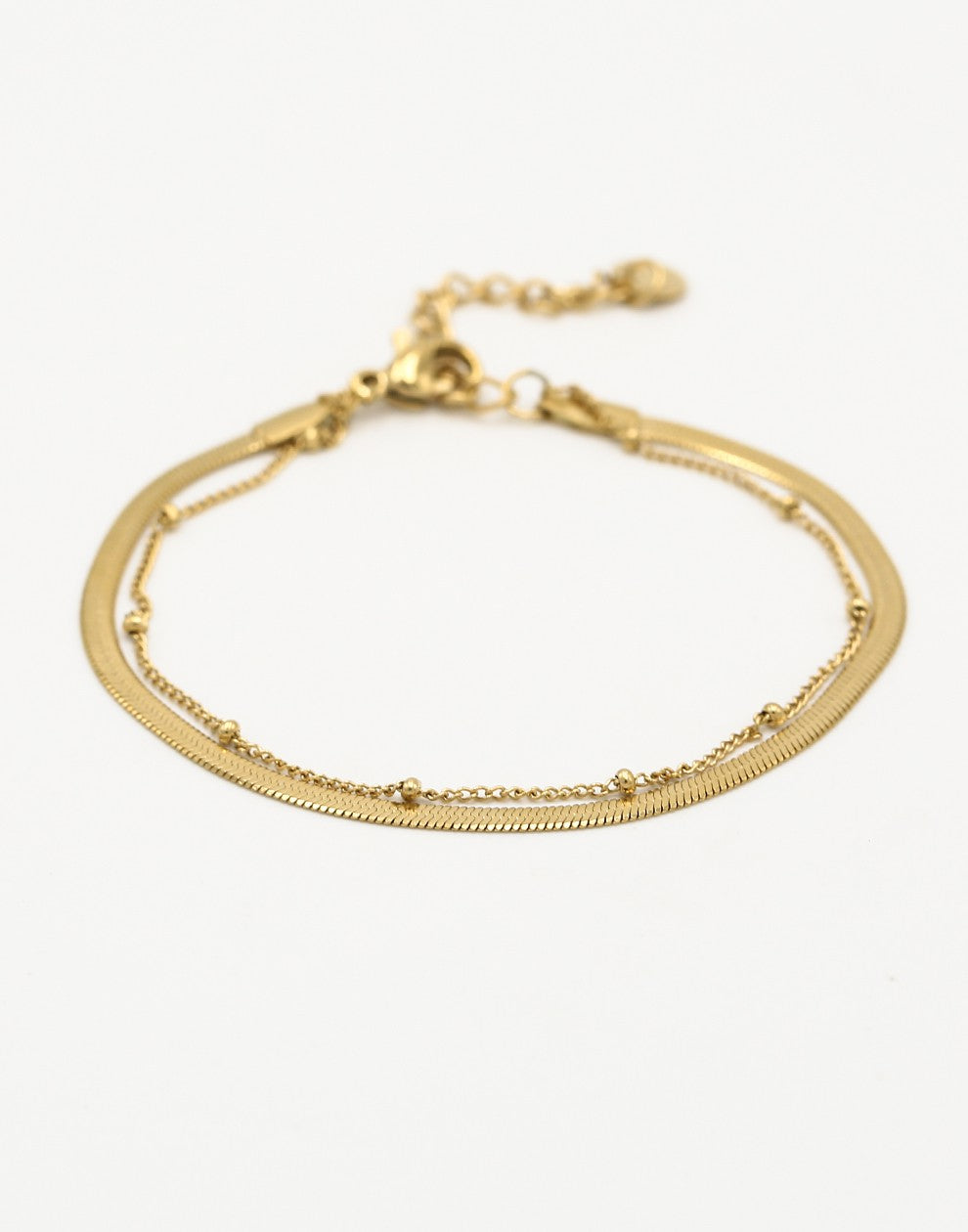 Dubbele armband plat met bolletje goudkleurig