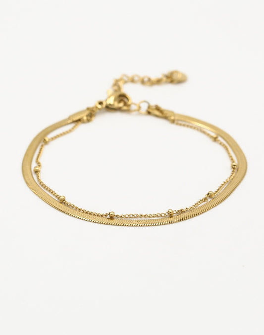 Dubbele armband plat met bolletje goudkleurig