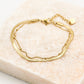 Dubbele armband plat met bolletje goudkleurig