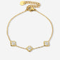 Armband klavers met steentjes goudkleurig