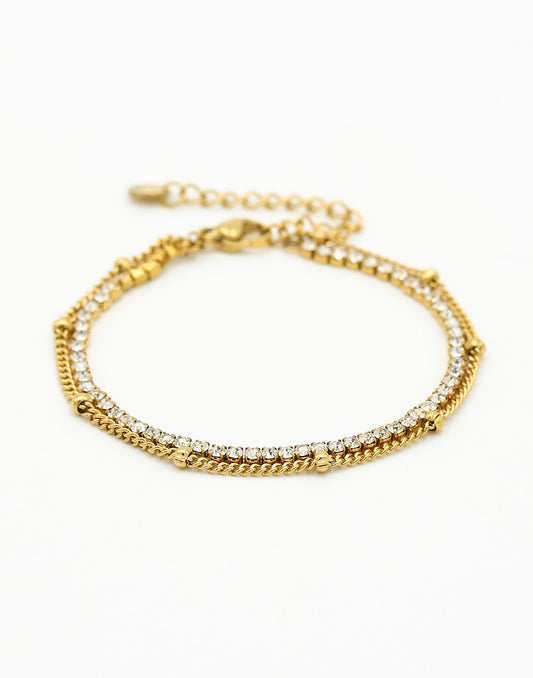 Tennis bracelet with gold-colored ball chain