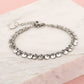 Armband bolletjes muntjes zilverkleurig